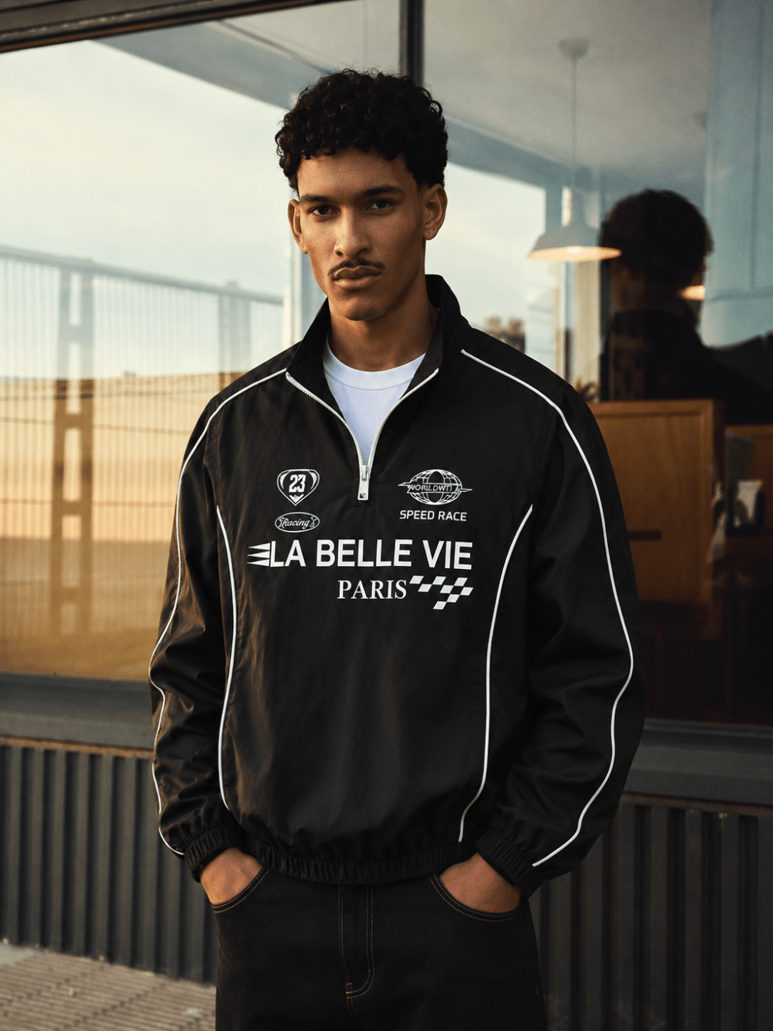 Men's Black Quarter Zip Racing Style Biker Funnel Neck Jacket With Graphic Print - Edin London